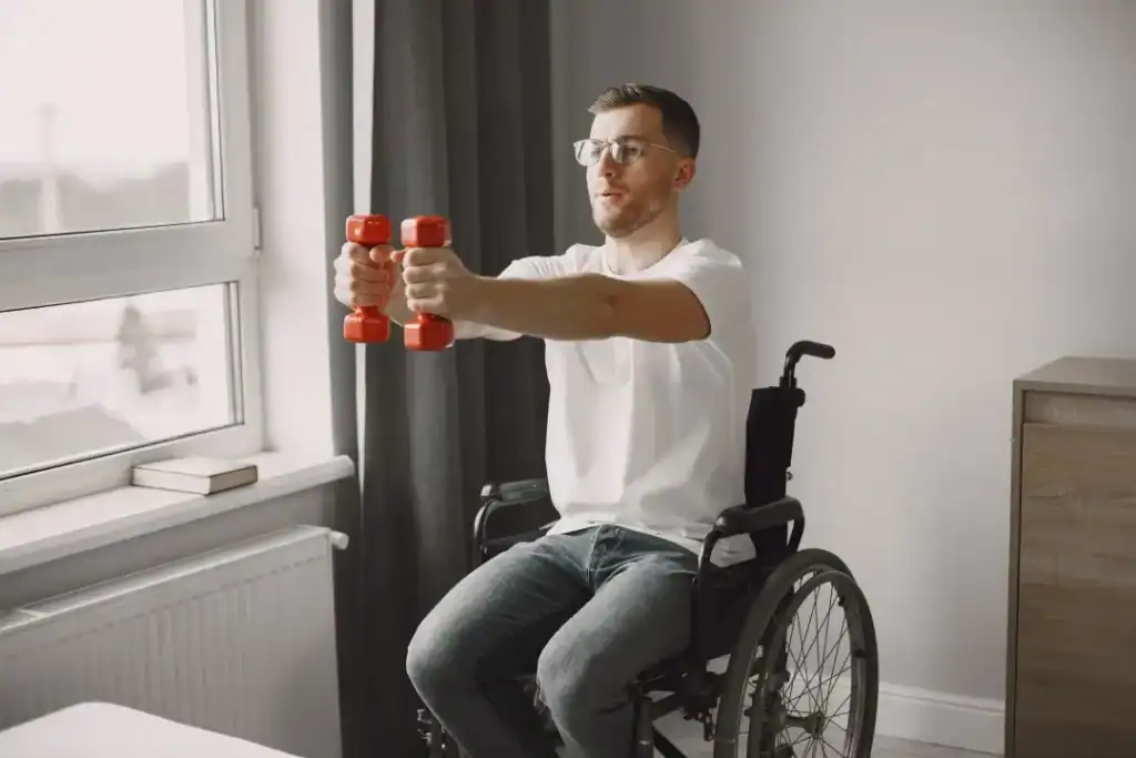 Empowering Weight Loss: A Comprehensive Guide for Individuals with Disabilities 1 Image of man doing exercise in his wheelchair to aid weight loss Northampton