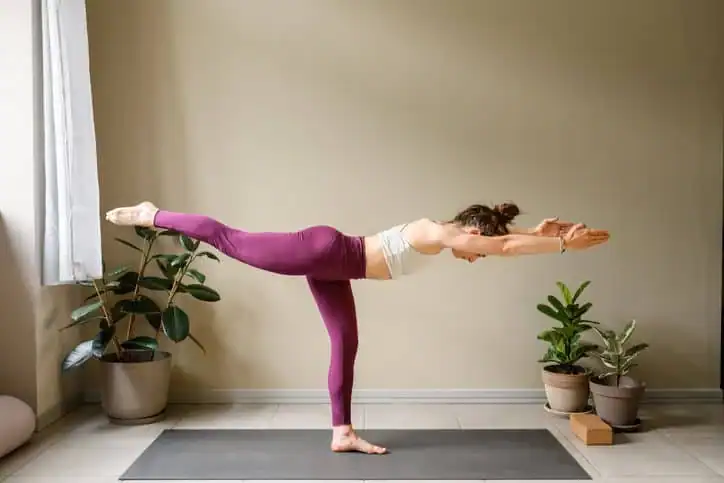 Achieving the Perfect Tone: How Often Should You Exercise for Results? 1 Woman doing Yoga exercise Northampton to help with toning the body.