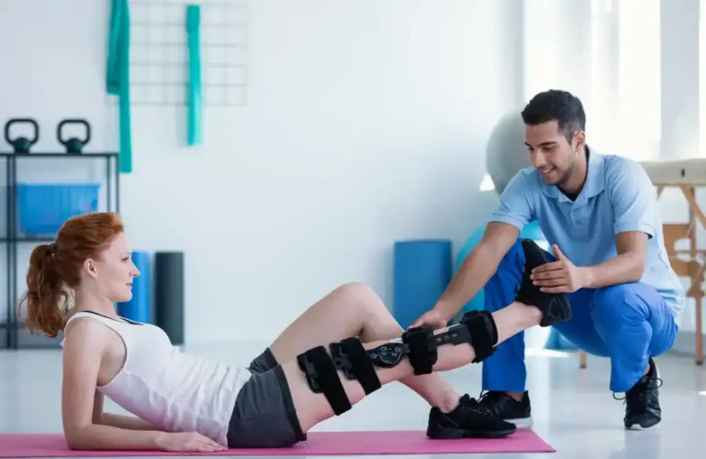 Debunking Meal Timing Myths: The Truth About Muscle Recovery 1 Woman having treatment to help muscle recovery Northampton after an injury
