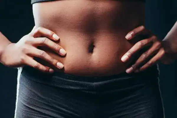 Toning Your Stomach: The Ultimate Guide to Achieving a Sculpted Stomach While Shedding Pounds 1 Image of a toned stomach after non surgical treatment Northampton